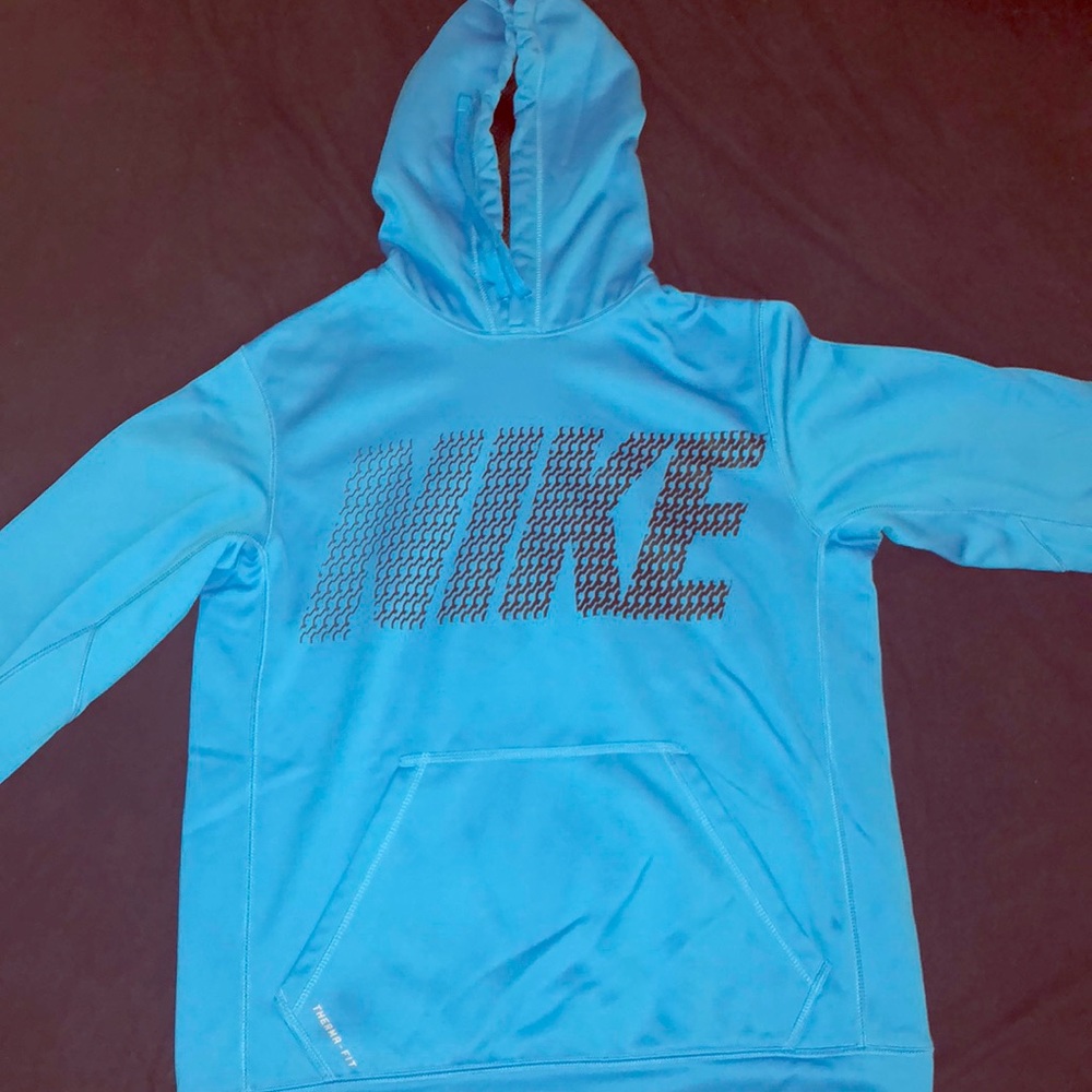 Nike sweatshirt size small.  On the longer side